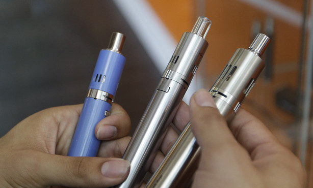 vaping e-cigarette...
