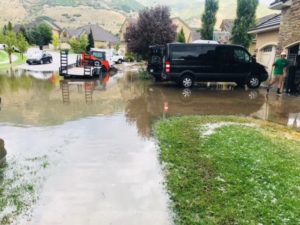 Listeners sent in photos of flooding, hail and storm damage.