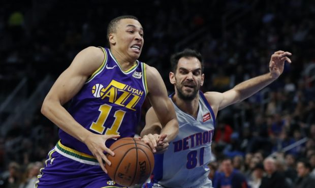 Detroit Pistons guard Jose Calderon (81) reaches in on Utah Jazz guard Dante Exum (11) during the f...