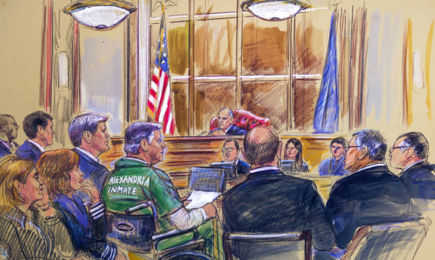Paul Manafort, center in a wheelchair, during his sentencing hearing in federal court before judge ...