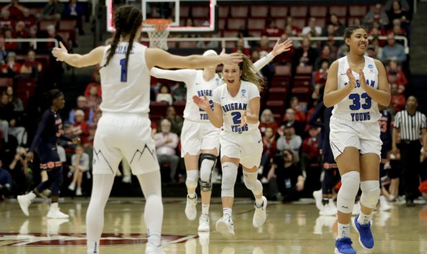 BYU celebrates after their win against Auburn during a first-round game in the NCAA women's college...