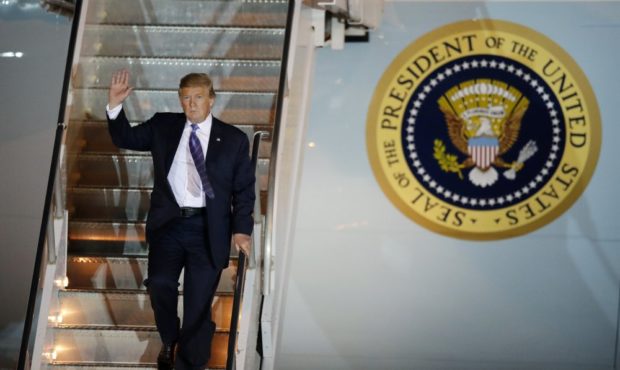 President Donald Trump disembarks from Air Force One after arriving at McCarran International Airpo...