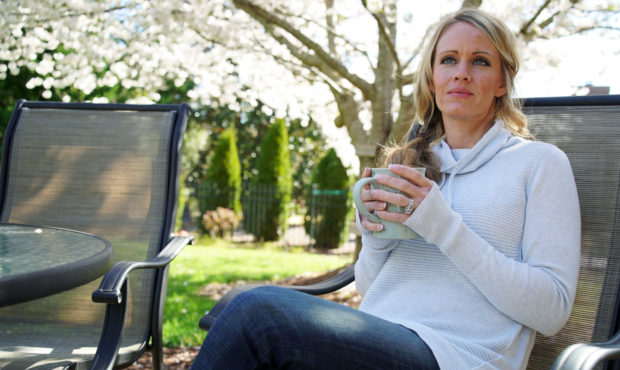 In this Wednesday, March 27, 2019, photo, Kacey Ruegsegger Johnson enjoys a coffee in a light sprin...