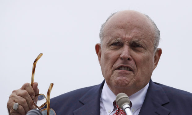 FILE - In this Aug. 1, 2018, file photo, Rudy Giuliani, an attorney for President Donald Trump, spe...