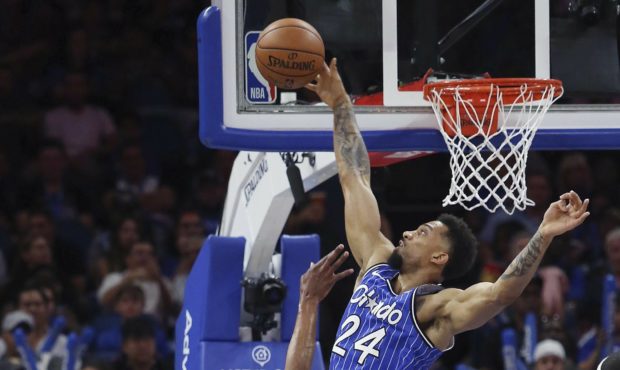 Orlando Magic center Khem Birch (24) blocks the shot of Atlanta Hawks guard Vince Carter (15) durin...