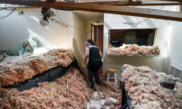 Erica Bohannon leads reporters through her destroyed apartment, Tuesday, May 28, 2019, in Trotwood,...