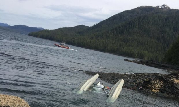 A Coast Guard Station Ketchikan 45-foot Response Boat-Medium boat crew searches for survivors from ...