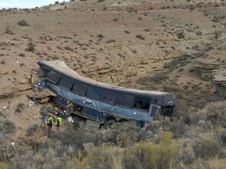 FILE - This Jan. 1, 2018, file photo, shows the aftermath of a Greyhound bus crash in Emery County,...