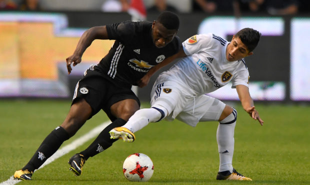 SANDY UT- JULY 17: Timothy Fosu-Mensah #24 of Manchester United and Jefferson Savarino #7 of Real S...