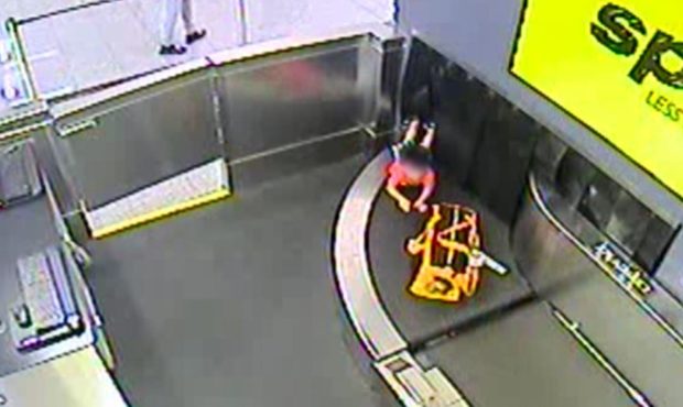 A toddler was injured after he climbed onto a baggage conveyor belt behind a ticket counter at Atla...