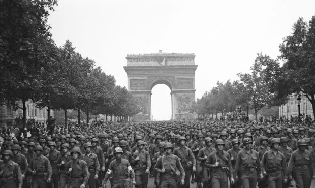 FILE - In this Aug. 29, 1944 file photo, U.S. soldiers of Pennsylvania's 28th Infantry Division mar...