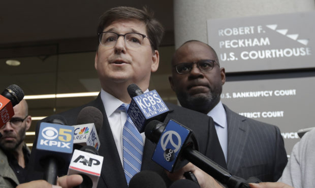 Attorneys Miles Ehrlich, left, and Ismail Ramsey, representing Anthony Levandowski, speak to report...