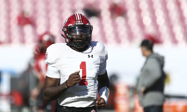 FILE-- Quarterback Tyler Huntley (1) warms up during the University of Utah scrimmage at Rice-Eccle...