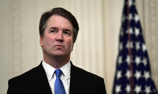 FILE - In this Oct. 8, 2018, file photo, Supreme Court Justice Brett Kavanaugh stands before a cere...