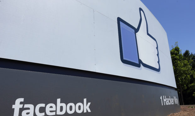 FILE - This July 16, 2013, file photo, shows a sign at Facebook headquarters in Menlo Park, Calif. ...