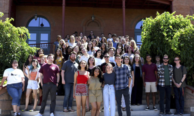 In this 2019 photo provided by The State Press is Andrew Howard, second row center left, a managing...