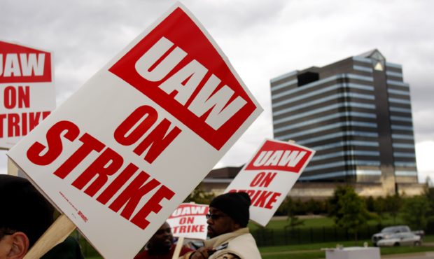 AUBURN HILLS MI - OCTOBER 10:  United Auto Workers members walk off the job and picket at the Chrys...