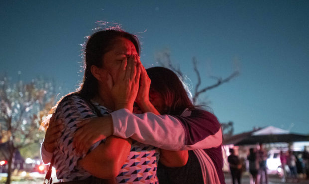 In this Sunday, Oct. 20, 2019 photo, Maribel Morales, a member of Primera Iglesia Dallas, is consol...
