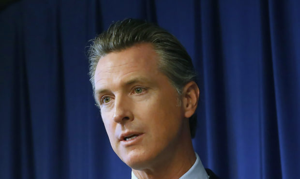 FILE - In this Wednesday, Sept. 18, 2019, file photo, Gov. Gavin Newsom speaks at a news conference...