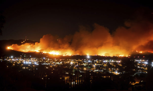 FILE - In this Oct. 31, 2019 file photo smoke from the Maria Fire billows above Santa Paula, Calif....