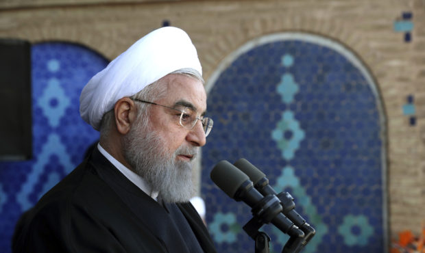 In this photo released by the official website of the office of the Iranian Presidency, President H...