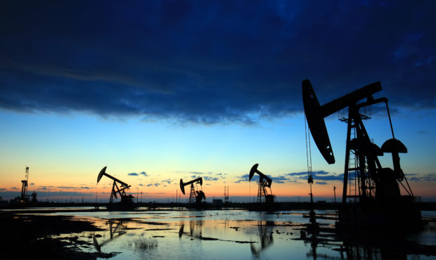 In the evening, the outline of the oil pump (Getty Images)...