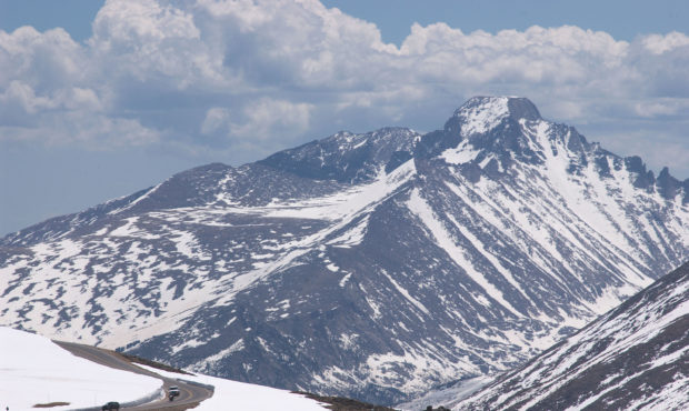 ROCKY MOUNTAIN NATIONAL PARK - MAY 23:  Cars drive down the Trail Ridge Road May 23, 2003 in Rocky ...