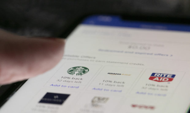 This Sunday, Dec. 1, 2019, photo shows rewards offered through Chase bank on an iPhone in the Brook...