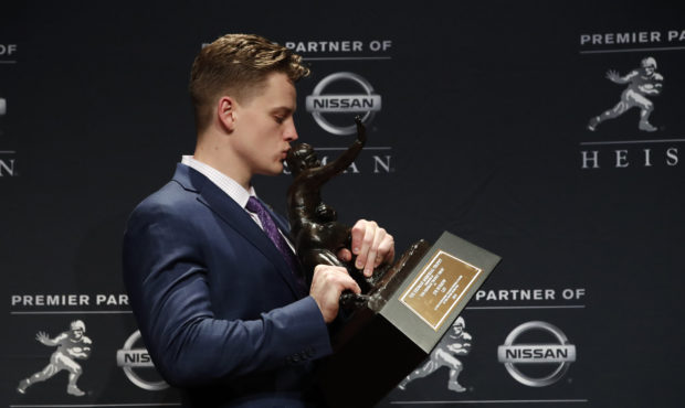 NCAA college football player, LSU quarterback Joe Burrow poses for a photo after winning the Heisma...