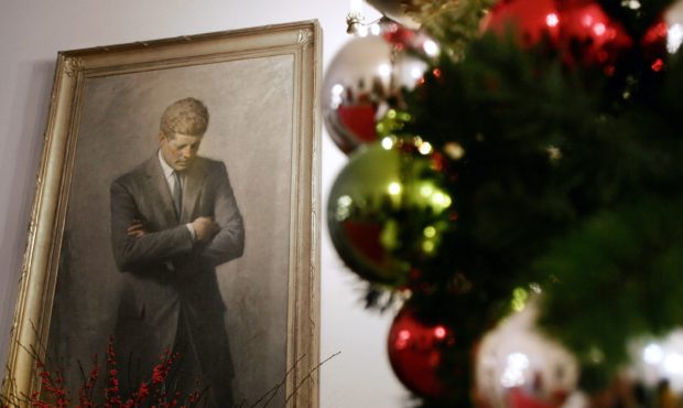 FILE - In this Nov. 30, 2006, file photo, a portrait of former President John F. Kennedy, framed by...