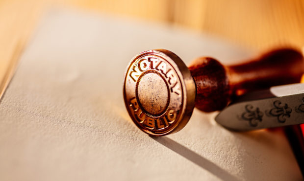 Notary public metal stamp on paper...