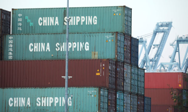 SAN PEDRO, CALIFORNIA - NOVEMBER 07: Shipping containers, some marked 'China Shipping', are stacked...