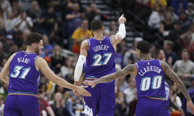 Utah Jazz forward Georges Niang (31), Utah Jazz center Rudy Gobert (27) and Utah Jazz guard Jordan ...