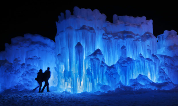 FILE – In this Saturday, Jan. 26, 2019 file photo, a couple heads toward an entrance to a cavern ...