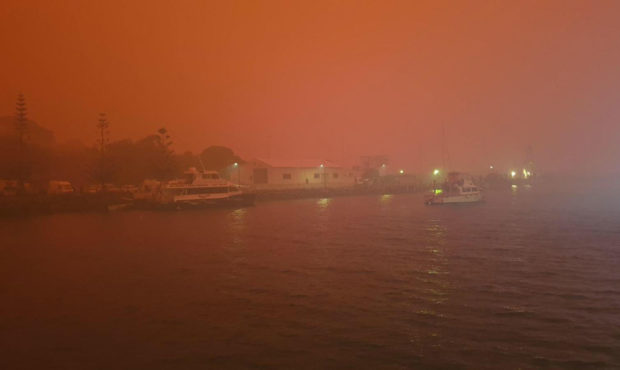 Sky is orange near Eden Australia where official sa they fear fatalities from the fires. Many house...
