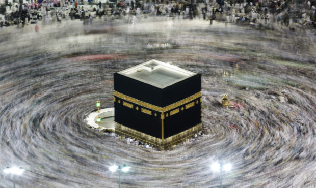 FILE - In this Aug. 13, 2019, file photo taken with a slow shutter speed, Muslim pilgrims circumamb...