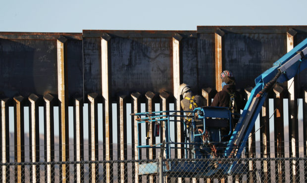The White House to ask for less money to fund border wall...