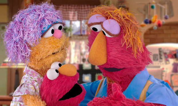 This undated image provided by Sesame Workshop shows Elmo and his parents Louie and Mae. Sesame Wor...