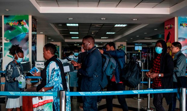 Passengers are asked to desinfect their hands upon arrival from international flights before being ...