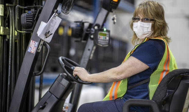 This photo provided by Cindy Parkhurst. shows Cindy Parkhurst working at the Ford Flat Rock Assembl...