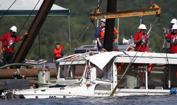FILE - In this July 23, 2018, file photo, a duck boat that sank in Table Rock Lake in Branson, Mo.,...