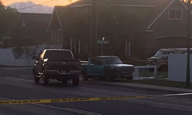 (Police investigating one of the crashes after the reported OIS.  Credit: Adam Sotello, Deseret New...