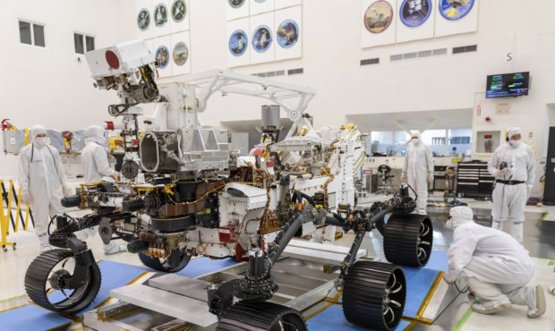 FILE - In this Dec. 17, 2019 photo made available by NASA, engineers monitor a driving test for the...