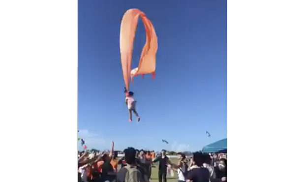 A 3-year-old girl in Taiwan was reported safe after becoming caught in the strings of a kite and li...