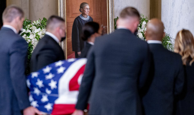 The flag-draped casket of Justice Ruth Bader Ginsburg arrives at the Supreme Court in Washington, W...