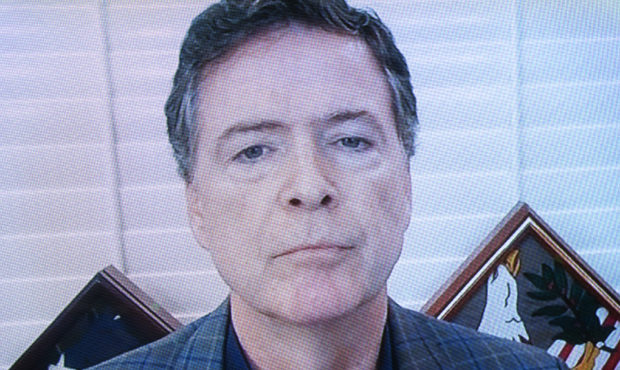 Former FBI director James Comey testifies via videoconference during a Senate Judiciary Committee h...