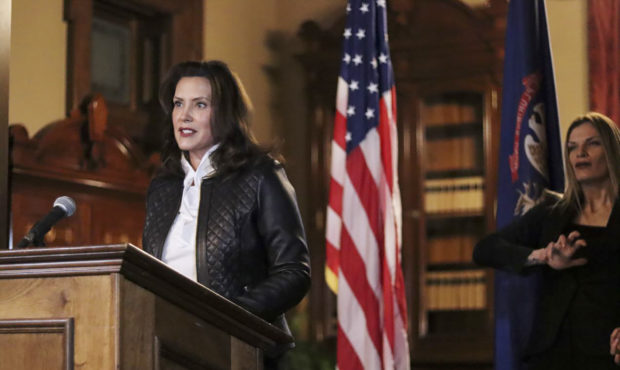 In a photo provided by the Michigan Office of the Governor, Michigan Gov. Gretchen Whitmer addresse...