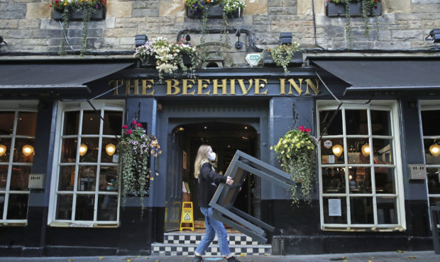UK at 'tipping point:' England braces for more restrictions...