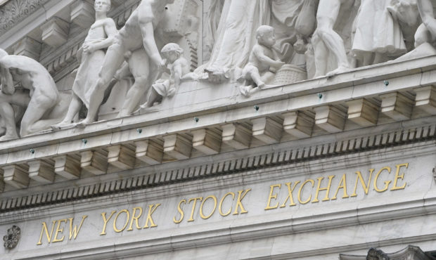 The sign is displayed at the New York Stock Exchange in New York, Monday, Nov. 23, 2020.  Stocks ar...