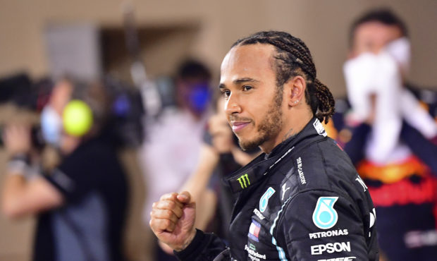 FILE - In this Sunday, Nov. 29, 2020 file photo, Mercedes driver Lewis Hamilton of Britain celebrat...